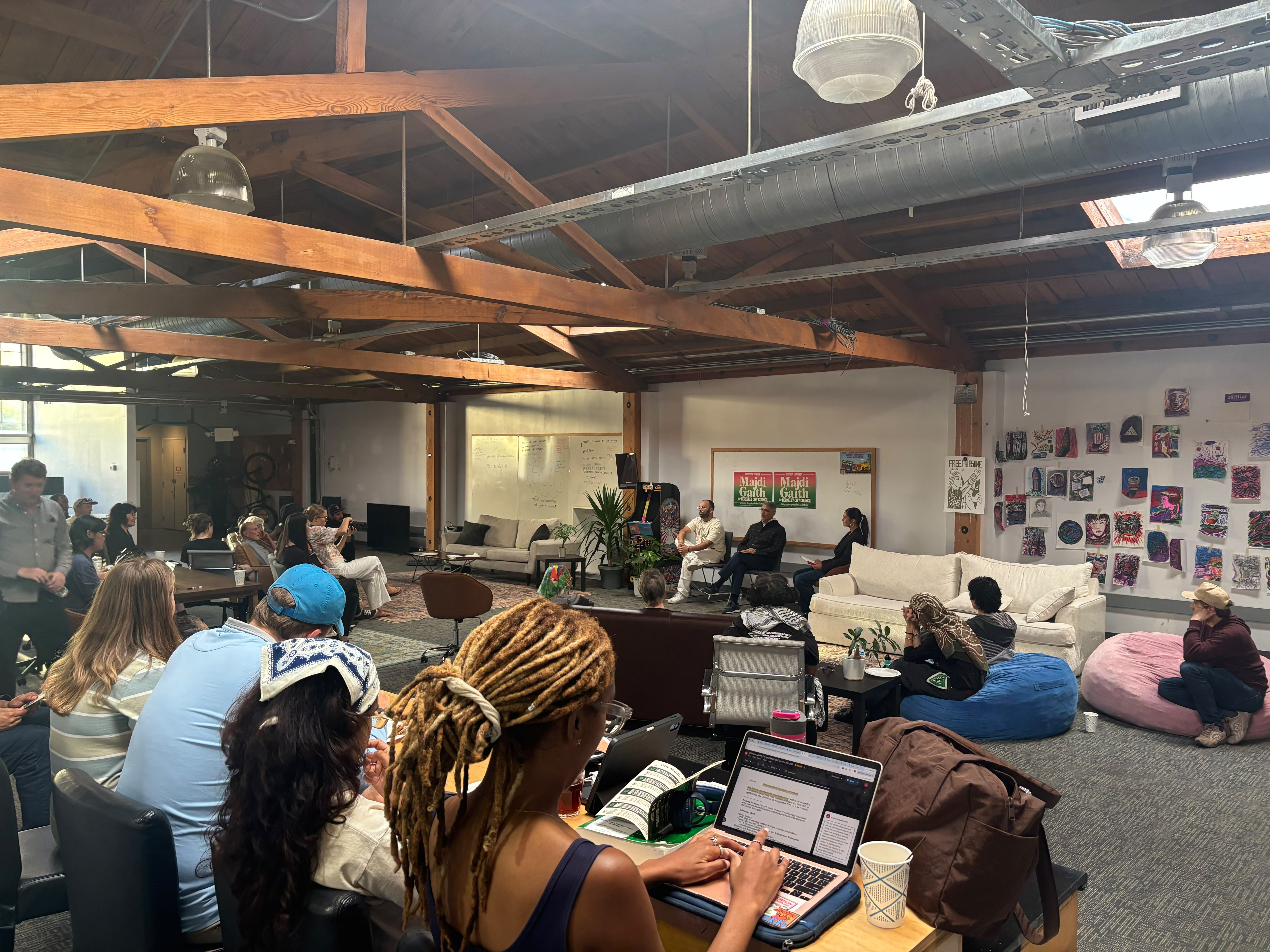 People gathering in the SoCo community space