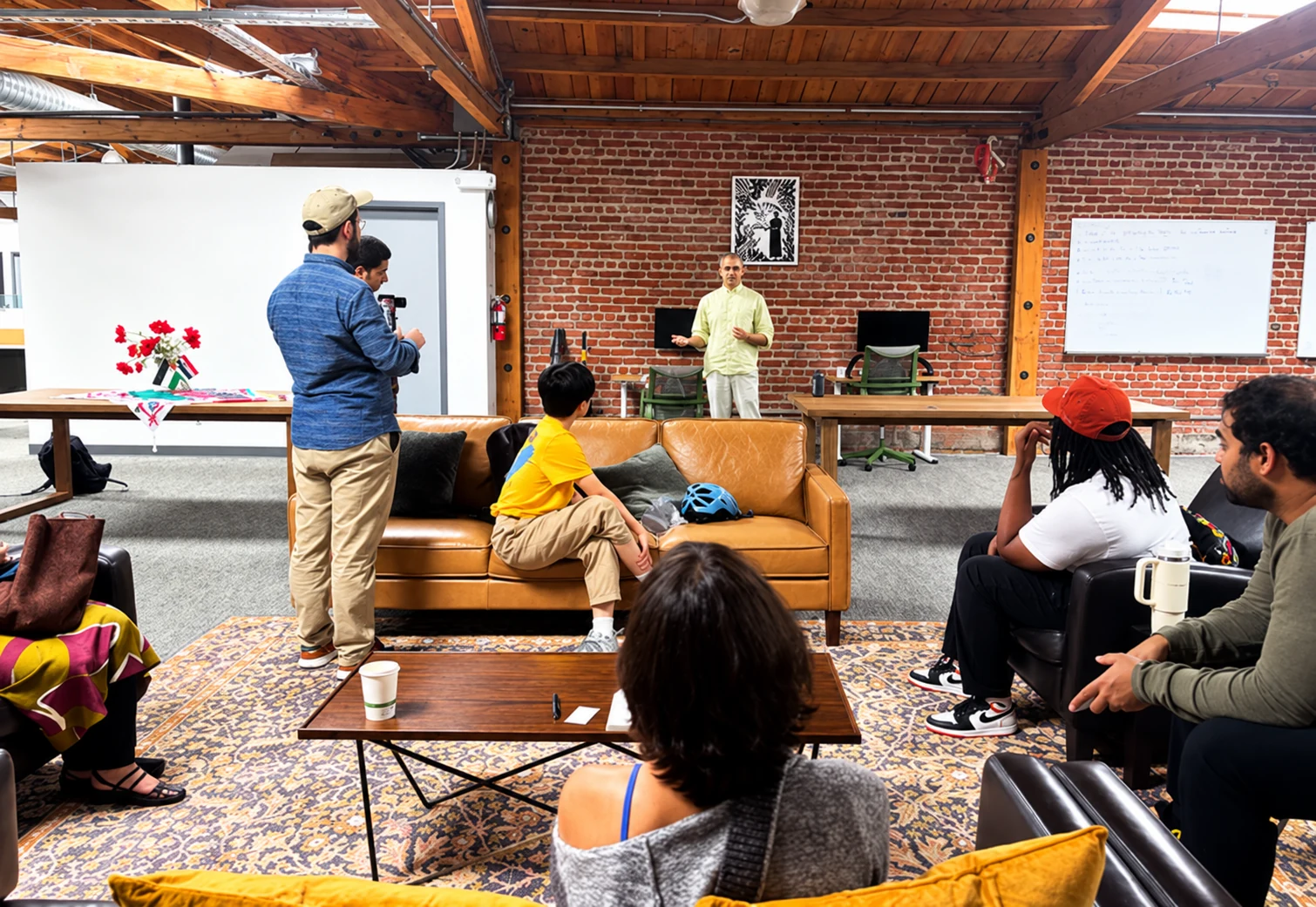 People gathered for a talk in SoCo’s community lounge